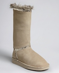 From Juicy Couture, an updated suede boot with glitter trim and plush faux-fur lining for cold-weather comfort. From Juicy Couture, an updated suede boot with glitter trim and plush faux-fur lining for cold-weather comfort.