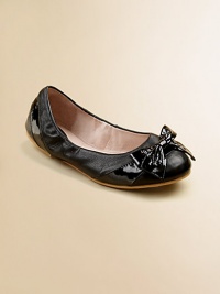 Elegantly simple slip-on flats in velvety soft leather with a big soft bow in front.Slip-onLeather and patent leather upperLeather liningRubber solePadded insoleImported Elegantly simple slip-on flats in velvety soft leather with a big soft bow in front.Slip-onLeather and patent leather upperLeather liningRubber solePadded insoleImported