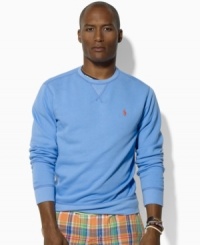 A versatile crewneck sweater is rendered in soft beach fleece and accented with Ralph Lauren's embroidered pony for a refined finish. A versatile crewneck sweater is rendered in soft beach fleece and accented with Ralph Lauren's embroidered pony for a refined finish.