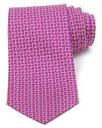 Repeating Gancini logos are rendered in two complementary colors and patterned with a whimsical design on this superior silk tie, offering a bit of refined luxury for the modern man. Repeating Gancini logos are rendered in two complementary colors and patterned with a whimsical design on this superior silk tie, offering a bit of refined luxury for the modern man.