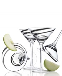 A ribbon of black in clear glass adds bold style to any martini, shaken or stirred. With a thick sham and sturdy construction, this martini glass is a sophisticated twist on the ordinary. A ribbon of black in clear glass adds bold style to any martini, shaken or stirred. With a thick sham and sturdy construction, this martini glass is a sophisticated twist on the ordinary.