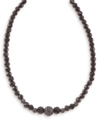 Go for dark drama with this sleek Carolee necklace. Graduated, faceted jet beads (8-10 mm) gleam alongside crystal-accented fireballs. Crafted in hematite-plated mixed metal. Approximate length: 16 inches + 2-inch extender. Go for dark drama with this sleek Carolee necklace. Graduated, faceted jet beads (8-10 mm) gleam alongside crystal-accented fireballs. Crafted in hematite-plated mixed metal. Approximate length: 16 inches + 2-inch extender.