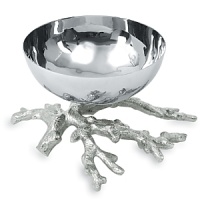 A lively cluster of coral supports the mirrored bowl of this elegant nut dish, evoking the interwoven web of ocean life.