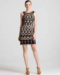 Enlivened by a graphic animal print, this Calvin Klein sheath dress injects your working wardrobe with exotic appeal. Tame the style with a classic cardigan for office chic. Enlivened by a graphic animal print, this Calvin Klein sheath dress injects your working wardrobe with exotic appeal. Tame the style with a classic cardigan for office chic.