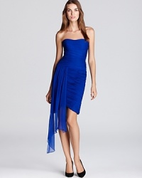 Silk chiffon draping lends a breezy look to this ML Monique Lhuillier dress, floating on in a vibrant cobalt hue. Silk chiffon draping lends a breezy look to this ML Monique Lhuillier dress, floating on in a vibrant cobalt hue.