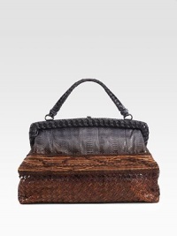 The beauty of Italian craftsmanship is evident in this ombre style with a luxurious woven python base, a threaded center and a patched top.Top handles, 4½ dropHinged, top clasp closureOne inside zip pocketSuede lining15W X 9H X 4DMade in Italy