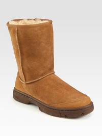 Warm sheepskin pull-on features molded rubber sole for quicker tread. Pull-on style Shearling lining Padded insole ImportedOUR FIT MODEL RECOMMENDS ordering true whole size; ½ sizes should order the next whole size up. Warm sheepskin pull-on features molded rubber sole for quicker tread. Pull-on style Shearling lining Padded insole ImportedOUR FIT MODEL RECOMMENDS ordering true whole size; ½ sizes should order the next whole size up.