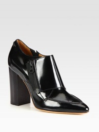 Exposed zipper, block high-heel and a timeless point toe add polished style to this leather silhouette. Stacked heel, 4 (100mm)Leather upperSide zipperLeather lining and solePadded insoleMade in Italy Exposed zipper, block high-heel and a timeless point toe add polished style to this leather silhouette. Stacked heel, 4 (100mm)Leather upperSide zipperLeather lining and solePadded insoleMade in Italy