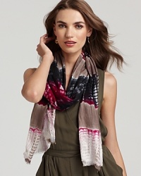 A boho-chic tie dye scarf with baby fringe edges. A boho-chic tie dye scarf with baby fringe edges.