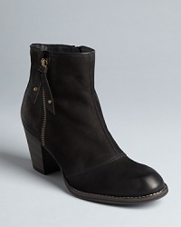 Take a subtle approach to your Western booties with this Paul Green design, set on stacked heels with topstiched soles. Take a subtle approach to your Western booties with this Paul Green design, set on stacked heels with topstiched soles.