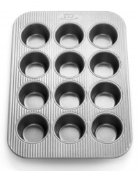 Proud to be American made! The commercial-grade heavy-gauge aluminized steel muffin pan features a unique fluted surface that promotes even air circulation while baking, so your sweet treats are always perfectly delicious. A nonstick, environmentally-friendly silicone finish is safe, natural and simply the best for baking. Lifetime warranty. Proud to be American made! The commercial-grade heavy-gauge aluminized steel muffin pan features a unique fluted surface that promotes even air circulation while baking, so your sweet treats are always perfectly delicious. A nonstick, environmentally-friendly silicone finish is safe, natural and simply the best for baking. Lifetime warranty.