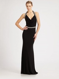 Sexy and elegant, finished with an artfully draped bodice and rich beaded trim.Halter-style cowl necklineDraped bodiceBeaded trimLow back with concealed zipFully linedAbout 45 from natural waistRayonDry cleanMade in USA of imported fabricModel shown is 5'10½ (179cm) wearing US size Small. Sexy and elegant, finished with an artfully draped bodice and rich beaded trim.Halter-style cowl necklineDraped bodiceBeaded trimLow back with concealed zipFully linedAbout 45 from natural waistRayonDry cleanMade in USA of imported fabricModel shown is 5'10½ (179cm) wearing US size Small.