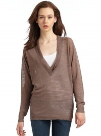 THE LOOKV neckline with uneven ribbed trimLong raglan sleeves with ribbed cuffsFrench seamsRibbed hemTHE FITAbout 27½ from shoulder to hemTHE MATERIAL56% linen/44% viscoseCARE & ORIGINDry cleanImported THE LOOKV neckline with uneven ribbed trimLong raglan sleeves with ribbed cuffsFrench seamsRibbed hemTHE FITAbout 27½ from shoulder to hemTHE MATERIAL56% linen/44% viscoseCARE & ORIGINDry cleanImported