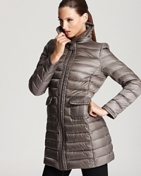 Moncler's Vanneau coat lends classic style in a timeless grey hue and practical mid-length. Princess seaming at the bust and back gives a flattering fit. Moncler's Vanneau coat lends classic style in a timeless grey hue and practical mid-length. Princess seaming at the bust and back gives a flattering fit.