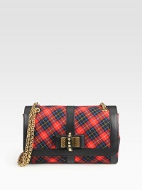 A mix of traditional plaid cotton with calfskin trim, bow detail and goldtone hardware.Double or single chain shoulder strap, 12½-22 dropPush-lock flap closureTwo open pockets under flapOne inside zip pocketOne inside open pocketSignature red lining10W X 6½H X 3DMade in Italy