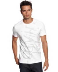 Toss on this Calvin Klein logo crew neck tee for a classic laid back look. Toss on this Calvin Klein logo crew neck tee for a classic laid back look.