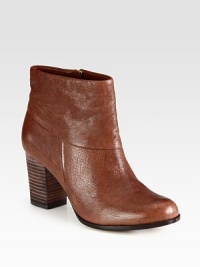 Rustic leather ankle boot has a chunky, stacked heel, side zipper and rubber sole for traction. Stacked heel, 3 (75mm)Leather upperSide zipperLeather liningRubber solePadded insoleImported Rustic leather ankle boot has a chunky, stacked heel, side zipper and rubber sole for traction. Stacked heel, 3 (75mm)Leather upperSide zipperLeather liningRubber solePadded insoleImported