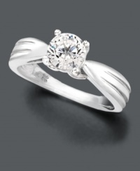 Capture the essence of a brilliant memory in one stunning diamond. This sophisticated engagement ring features a sparkling round-cut diamond (3/4 ct. t.w.) in a polished 18k white gold setting. Band of ring tapers at center. IGI Certified diamond. Capture the essence of a brilliant memory in one stunning diamond. This sophisticated engagement ring features a sparkling round-cut diamond (3/4 ct. t.w.) in a polished 18k white gold setting. Band of ring tapers at center. IGI Certified diamond.