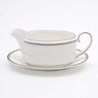 A beautiful collection for formal dining in white fine bone china with delicate platinum-hued rim accents. A beautiful collection for formal dining in white fine bone china with delicate platinum-hued rim accents.
