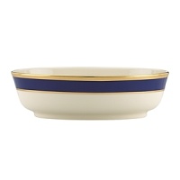 Inspired by privately commissioned presidential dinnerware, this fine china features stately navy bands and a gold border etched with patriotic stars. Inspired by privately commissioned presidential dinnerware, this fine china features stately navy bands and a gold border etched with patriotic stars.