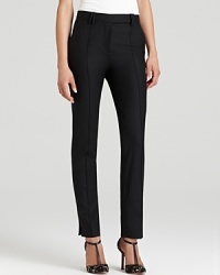 Shake up your 9-to-5 suiting basics with skinny Halston Heritage pants, impeccably tailored for a sleek silhouette. Ankle vents finish the style with unexpected edge. Shake up your 9-to-5 suiting basics with skinny Halston Heritage pants, impeccably tailored for a sleek silhouette. Ankle vents finish the style with unexpected edge.