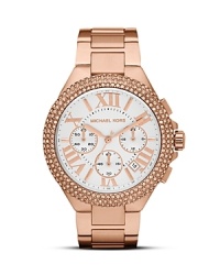 In the season's hottest color--rose gold--this Michael Kors watch is a sophisticated and stylish every day accessory.