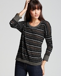 A tinge of sparkle shines up the stripes on this ALTERNATIVE sweater that's best paired with your favorite denim. A tinge of sparkle shines up the stripes on this ALTERNATIVE sweater that's best paired with your favorite denim.