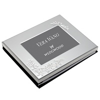 Designed with the bride in mind, the Vera Lace Bouquet guest book features a delicate raised floral motif that evokes Vera Wang's well-known love of flowers. This feminine yet contemporary piece is a keepsake-worthy gift she'll cherish. Designed with the bride in mind, the Vera Lace Bouquet guest book features a delicate raised floral motif that evokes Vera Wang's well-known love of flowers. This feminine yet contemporary piece is a keepsake-worthy gift she'll cherish.