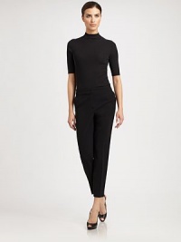 This finely rib-knit pullover is the perfect layering piece.Mock neckShort sleeves53% wool/47% rayonDry cleanImported of domestic fabricModel shown is 5'11 (180cm) wearing US size Small. This finely rib-knit pullover is the perfect layering piece.Mock neckShort sleeves53% wool/47% rayonDry cleanImported of domestic fabricModel shown is 5'11 (180cm) wearing US size Small.