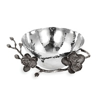 By interpreting plant forms in cast metal, Michael Aram presents work which is evocative of a natural environment transformed and redefined. Says the designer, There is a velvety luxury–an almost gothic quality – to representing orchids in blackened nickel. To me, the pieces feel seductive and graceful, yet dark and unexpected. By interpreting plant forms in cast metal, Michael Aram presents work which is evocative of a natural environment transformed and redefined. Says the designer, There is a velvety luxury–an almost gothic quality – to representing orchids in blackened nickel. To me, the pieces feel seductive and graceful, yet dark and unexpected.