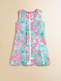 A fun tropical print in a simple silhouette with a pretty ruffle in front.Round necklineSleevelessCenter front ruffle with grosgrain trimBack zipperFully lined75% cotton/25% polyesterMachine washImported A fun tropical print in a simple silhouette with a pretty ruffle in front.Round necklineSleevelessCenter front ruffle with grosgrain trimBack zipperFully lined75% cotton/25% polyesterMachine washImported