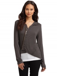 THE LOOKHooded styleAsymmetrical zip frontLong sleevesHi-lo hemTHE FITAbout 28 from shoulder to longest point of hemTHE MATERIALModal/silk/spandexCARE & ORIGINMachine washMade in USAModel shown is 5'8 (172½cm) wearing US size Small. THE LOOKHooded styleAsymmetrical zip frontLong sleevesHi-lo hemTHE FITAbout 28 from shoulder to longest point of hemTHE MATERIALModal/silk/spandexCARE & ORIGINMachine washMade in USAModel shown is 5'8 (172½cm) wearing US size Small.