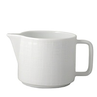 An ideal service for contemporary interiors, the simplicity of the finish resembles the weave of a natural fabric. The basis for Everyday Elegance, this versatile porcelain service offers the ability to go from day to evening with the substitution of a mug to tea cup/saucer and coupe soup to rim soup.