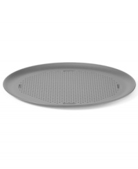 Dish out the perfect pie! This pizza pan gives homemade (or even store bought) crust the crunch you love. The perforated, heavy-gauge steel pan features two interlocking layers of high-performance nonstick that browns and perfectly crisps. Lifetime warranty. Dish out the perfect pie! This pizza pan gives homemade (or even store bought) crust the crunch you love. The perforated, heavy-gauge steel pan features two interlocking layers of high-performance nonstick that browns and perfectly crisps. Lifetime warranty.