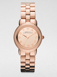 A warm rose goldtone ion-plated stainless steel timepiece with logo markers. Quartz movementWater resistant to 5 ATMRound rose goldtone ion-plated stainless steel case, 27.5mm (1)Smooth bezelRose goldtone mirror dialLogo hour markersSecond hand Rose goldtone stainless steel link braceletImported A warm rose goldtone ion-plated stainless steel timepiece with logo markers. Quartz movementWater resistant to 5 ATMRound rose goldtone ion-plated stainless steel case, 27.5mm (1)Smooth bezelRose goldtone mirror dialLogo hour markersSecond hand Rose goldtone stainless steel link braceletImported