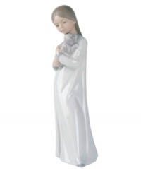 A comforting display of reciprocated love, this timeless figurine is handcrafted of smooth porcelain and offers the perfect gift for someone special. A comforting display of reciprocated love, this timeless figurine is handcrafted of smooth porcelain and offers the perfect gift for someone special.