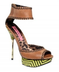 Daring, sexy, and colorful, too. Betsey Johnson's Tricksy platform sandals feature a shiny metallic stiletto heel, black stitching around the edges, and a funky, printed platform. Daring, sexy, and colorful, too. Betsey Johnson's Tricksy platform sandals feature a shiny metallic stiletto heel, black stitching around the edges, and a funky, printed platform.