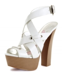 Up your glamour game. A towering stacked platform and chunky heel raises the style factor of the strappy Rhea sandals by Paris Hilton. Up your glamour game. A towering stacked platform and chunky heel raises the style factor of the strappy Rhea sandals by Paris Hilton.