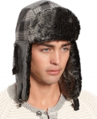 Whether you're wandering through the woods or the city streets, this stylish American Rag trapper hat has got you covered. Whether you're wandering through the woods or the city streets, this stylish American Rag trapper hat has got you covered.