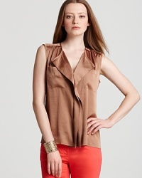 Delicate ruffles lend feminine ease to this VINCE CAMUTO shirt, while a statement shade takes the look from charming to chic. Delicate ruffles lend feminine ease to this VINCE CAMUTO shirt, while a statement shade takes the look from charming to chic.