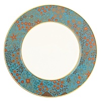 The luxurious, museum-quality floral motifs in Gilded Tapestry create a dramatic presentation sure to command attention at any dinner party. Warm ember hues and golden tones are offset by cool blue accents on this compelling pattern. Unique layering of of each place setting piece atop the other highlights the common threads of color and metallics while creating a sophisticated style. The luxurious, museum-quality floral motifs in Gilded Tapestry create a dramatic presentation sure to command attention at any dinner party. Warm ember hues and golden tones are offset by cool blue accents on this compelling pattern. Unique layering of of each place setting piece atop the other highlights the common threads of color and metallics while creating a sophisticated style.