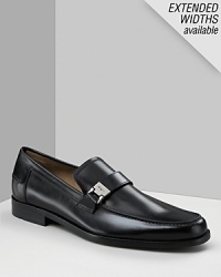 Leather slides with tonal topstitching and leather strap on front. Brushed silver buckle with Ferragamo engraved on the front. Features a slightly treaded sole for non-slip bottom. Leather slides with tonal topstitching and leather strap on front. Brushed silver buckle with Ferragamo engraved on the front. Features a slightly treaded sole for non-slip bottom.