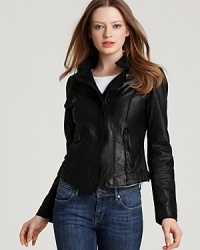 Short but not-so-sweet, this downtown-chic Andrew Marc jacket gets edgy in an asymmetric silhouette with raw trims and stitched details. Short but not-so-sweet, this downtown-chic Andrew Marc jacket gets edgy in an asymmetric silhouette with raw trims and stitched details.