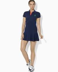 Vibrant color-blocked details and a sleek stretch cotton mesh construction create our ball girl dress, part of our collection celebrating the US Open Championship.