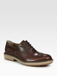 A weekend classic in burnished Italian calfskin, detailed with oxford perforations and a rugged lug sole.Leather liningPadded insoleRubber soleMade in Italy A weekend classic in burnished Italian calfskin, detailed with oxford perforations and a rugged lug sole.Leather liningPadded insoleRubber soleMade in Italy