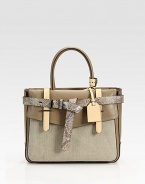 Burnished glovetan leather pairs with linen in this structured carryall wrapped in a luxe python belt.Double top handles, 6 dropOne outside flap pocketOne inside open pocketTwo inside zip pocketsCotton lining12W X 9½H X 4DImported