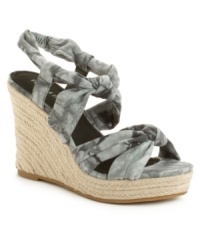 Tie together an idyllic seasonal look with Rampage's Brixton wedge sandals. With darling tie-dyed fabric straps and an au natural straw wedge heel, you'll breeze into the blooming months. Tie together an idyllic seasonal look with Rampage's Brixton wedge sandals. With darling tie-dyed fabric straps and an au natural straw wedge heel, you'll breeze into the blooming months.