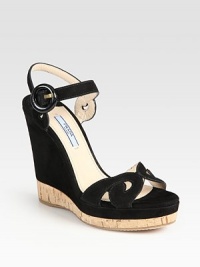 Suede design with a buckled ankle strap and cork detail.Cork and suede wedge, 4¾ (120mm) Cork and suede platform, 1 (25mm) Compares to a 3¾ heel (95mm) Suede upperBuckled ankle strapLeather lining and solePadded insoleMade in ItalyOUR FIT MODEL RECOMMENDS ordering one half size up as this style runs small. Suede design with a buckled ankle strap and cork detail.Cork and suede wedge, 4¾ (120mm) Cork and suede platform, 1 (25mm) Compares to a 3¾ heel (95mm) Suede upperBuckled ankle strapLeather lining and solePadded insoleMade in ItalyOUR FIT MODEL RECOMMENDS ordering one half size up as this style runs small.