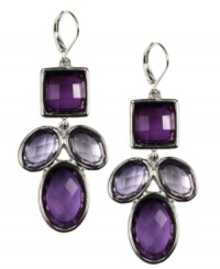 Pretty in purple. AK Anne Klein's bold design highlights a cluster of sparkling purple crystal accents. Crafted in imitation rhodium-plated mixed metal. Approximate drop: 2 inches.