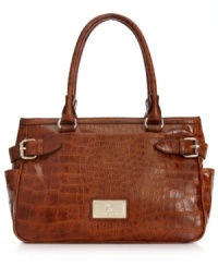 Tap into this season's exotic trend with Anne Klein's croc-embossed satchel that lends a look of uptown elegance. Dazzling golden hardware and buckle accents adorn the exterior, while plenty of pockets offer superb organization within. Tap into this season's exotic trend with Anne Klein's croc-embossed satchel that lends a look of uptown elegance. Dazzling golden hardware and buckle accents adorn the exterior, while plenty of pockets offer superb organization within.